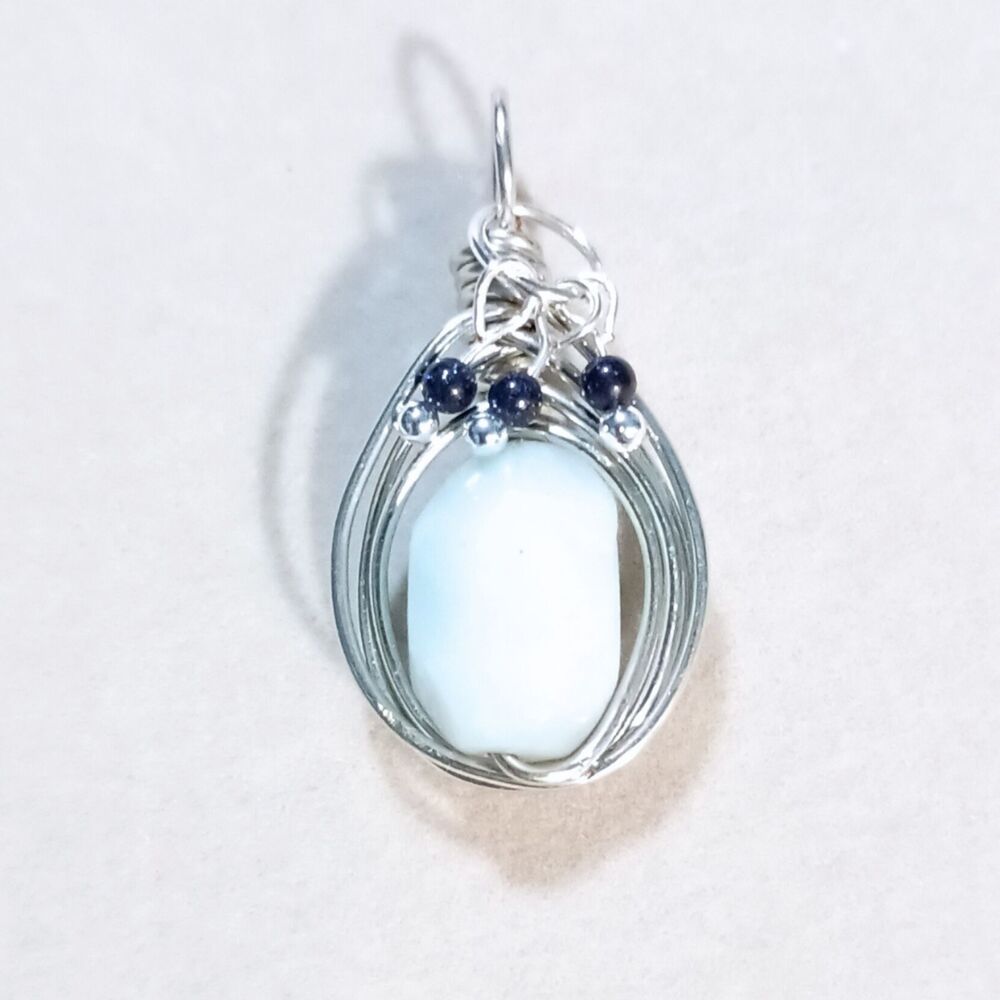 Ethereal Sky Pendant | Hand-wrapped Aquamarine Pendant with Movement